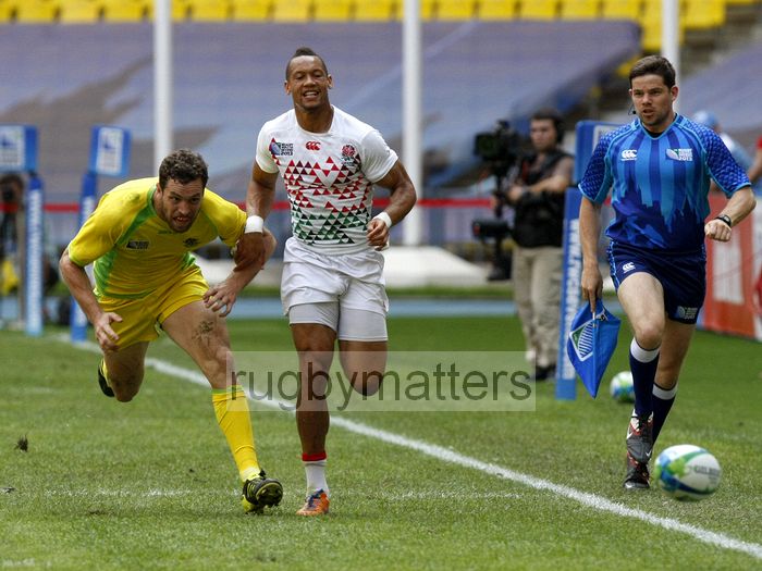 Dan Norton in action for England in their Cup Quarter Final match against Australia. IRB RWC 7s at Luzhniki Stadium, Moscow, 30th June 2013