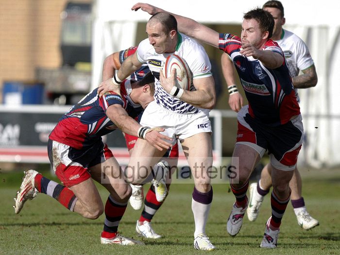 David Doherty tackled by Jamie Lennard and Michael Keating. Doncaster Knights v Leeds Carnegie at Castle Park, Doncaster on 16th January 2013, KO 1430. RFU Championship - Stage 1.