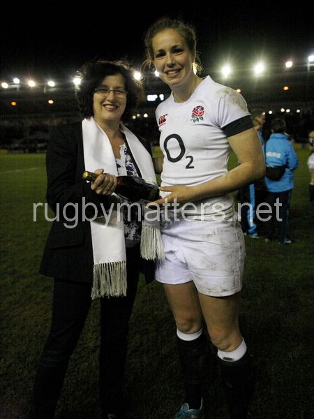 Emily Scarratt receiving Player of the Match Award from Deborah Griffin. England Women v Wales Women at Twickenham Stoop, Twickenham, England on 7th March 2014 ko 1930