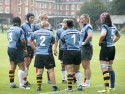 Catherine Spencer shares tactical ideas with team mates. Nomads v South Africa, The Lensbury, Broom Road, Teddington, Middlesex, England, on 28th June 2014, ko 2pm.