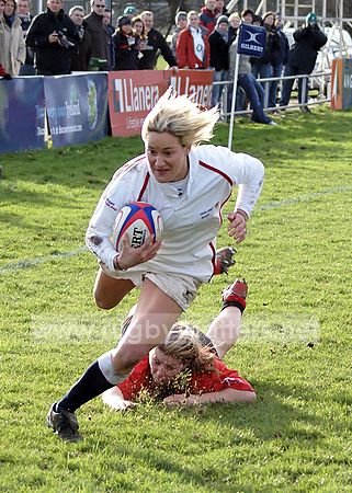 Claire Allan runs in to score for England against Wales