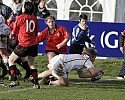 England Captain, Catherine Spencer, goes over in the corner for a try against Wales