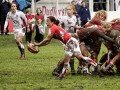 Amy Day clears from the scrum