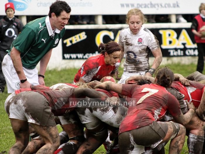 The referee keeps a close eye of the Amy Day put in to the scrum