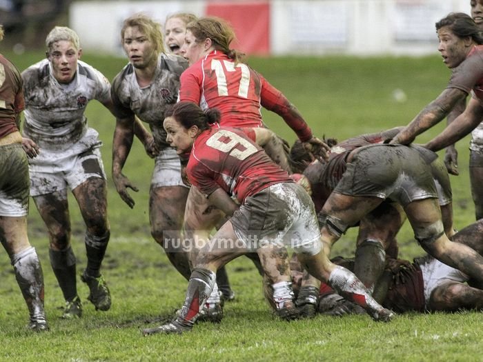 Amy Day passes from the  base of the scrum
