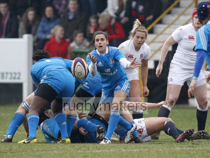 Sara Barattin passes the ball from the back of a ruck. England Women v Italy Women at Esher RFC, Moseley Road, Hersham, Surrey on 9th March 2013, KO 1300.