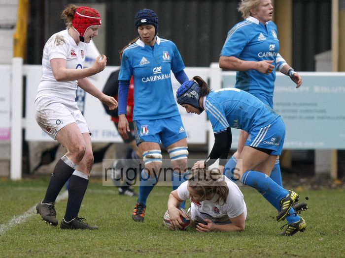 Rosemarie Crowley grounds the ball to score a try. England Women v Italy Women at Esher RFC, Moseley Road, Hersham, Surrey on 9th March 2013, KO 1300.