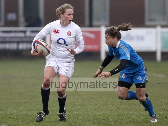 Amber Reed in action with Sofia Stefan coming in to tackle. England Women v Italy Women at Esher RFC, Moseley Road, Hersham, Surrey on 9th March 2013, KO 1300.