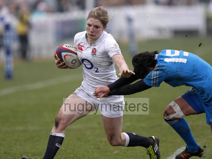 Lydia Thompson tackled by Manuela Furlon who takes her into touch. England Women v Italy Women at Esher RFC, Moseley Road, Hersham, Surrey on 9th March 2013, KO 1300.