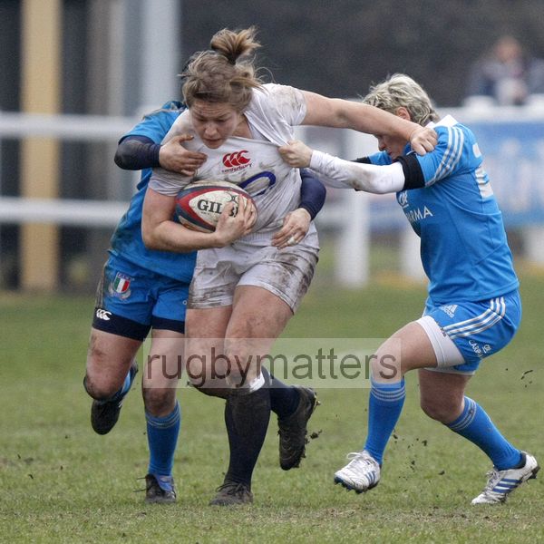 Rosemarie Crowley breaks through the tackles. England Women v Italy Women at Esher RFC, Moseley Road, Hersham, Surrey on 9th March 2013, KO 1300.
