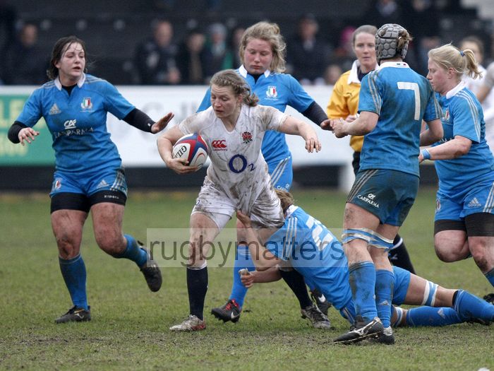 Hannah Gallagher takes on the Italian defence. England Women v Italy Women at Esher RFC, Moseley Road, Hersham, Surrey on 9th March 2013, KO 1300.