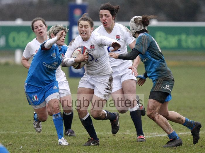 Lauren Cattell takes on the Italian defence. England Women v Italy Women at Esher RFC, Moseley Road, Hersham, Surrey on 9th March 2013, KO 1300.