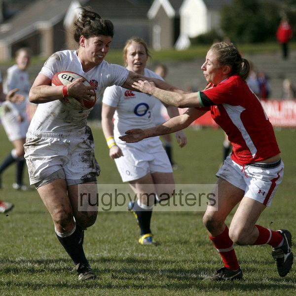 Captain Sarah Hunter charges for the line and goes on to score a try despite the attempt to tackle by Elinor Snowsil. Wales Women v England Women at Talbot Athletic Ground, Manor Street, Port Talbot, West Glamorgan, Wales on 17th March 2013 KO 1430