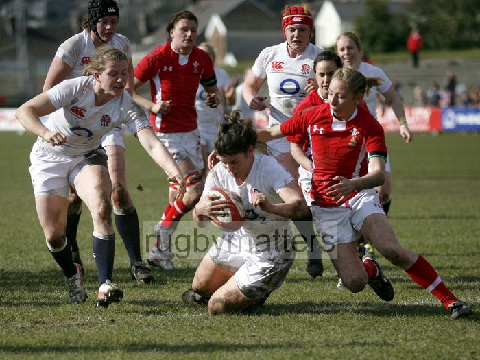 Captain Sarah Hunter crosses the line to score a try despite the attempt to tackle by Elinor Snowsil. Wales Women v England Women at Talbot Athletic Ground, Manor Street, Port Talbot, West Glamorgan, Wales on 17th March 2013 KO 1430