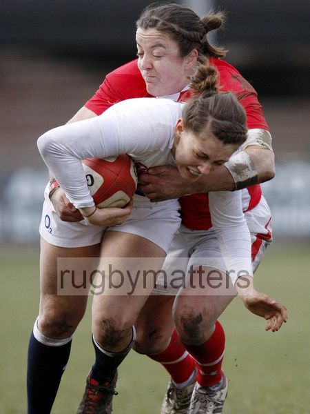 Lauren Cattell caught in possession by Elan Evans. Wales Women v England Women at Talbot Athletic Ground, Manor Street, Port Talbot, West Glamorgan, Wales on 17th March 2013 KO 1430