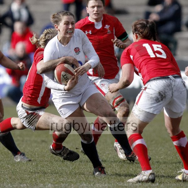 Lauren Cattell tackled by Elinor Snowsill . Wales Women v England Women at Talbot Athletic Ground, Manor Street, Port Talbot, West Glamorgan, Wales on 17th March 2013 KO 1430