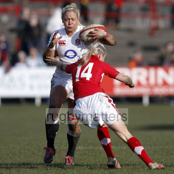 Sally Tuson tackled by Caryl James. Wales Women v England Women at Talbot Athletic Ground, Manor Street, Port Talbot, West Glamorgan, Wales on 17th March 2013 KO 1430