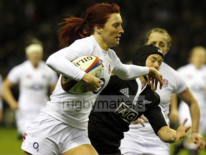 Jo Watmore brushes Emma Jensen aside. England v New Zealand in Autumn International Series at Twickenham, England on 1st December 2012.