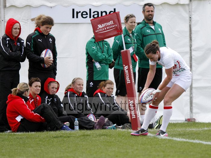 Kat Merchant crosses the line to score a try for England as the Irish team looks on. Womens International Invitational tournament at the Marriott London Sevens. At Cardinal Vaughan and Twickenham Stadium, Whitton Road, Twickenham. On 11th May 2013.