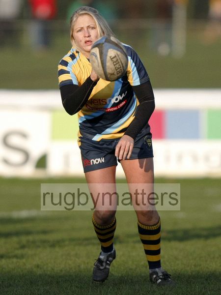 Ceri Large passes the ball. Richmond v Worcester, 13th January 2013, The Athletic Ground, Twickenham Road, London.