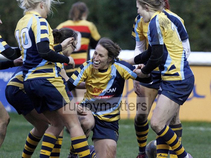 Kat Merchant is congratulated by her team mates after scoring a try. Richmond v Worcester, 13th January 2013, The Athletic Ground, Twickenham Road, London.