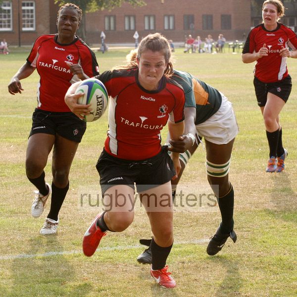 Sarah Gordon makes a break and goes on to score a try. Canada v South Africa in the U20's Nations Cup, Trent College, Derby Road, Long Eaton, Nottingham, 17th July 2013, kick off 1700.