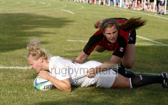 Lauren Chenoweth grounds the ball to score a try. England v Canada in the U20's Nations Cup, Trent College, Derby Road, Long Eaton, Nottingham, 14th July 2013, kick off 1700.