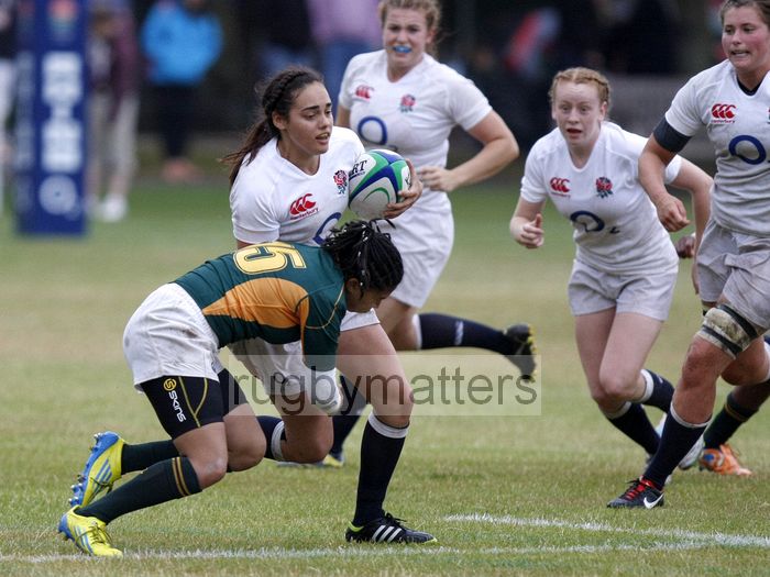 Chelsey Fuggle tackled by Kirsten Conrad. England v South Africa in the U20's Nations Cup 3rd/4th place, Trent College, Derby Road, Long Eaton, Nottingham, 21st July 2013, kick off 1400.