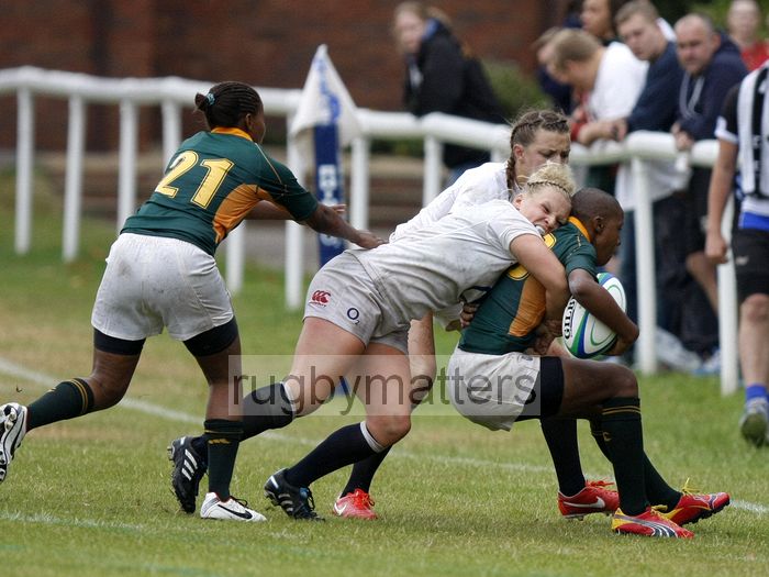 Vuyolwethu Maqholo gets pushed into touch by Lauren Chenoweth and Holly Molesworth. England v South Africa in the U20's Nations Cup 3rd/4th place, Trent College, Derby Road, Long Eaton, Nottingham, 21st July 2013, kick off 1400.