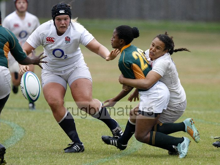 Nonhlanhla Mtambo tackled by Rochelle Smith. England v South Africa in the U20's Nations Cup 3rd/4th place, Trent College, Derby Road, Long Eaton, Nottingham, 21st July 2013, kick off 1400.