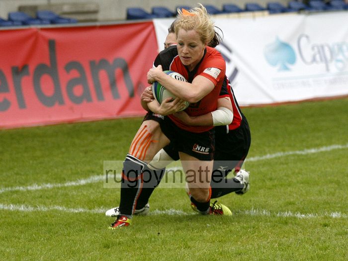 Anne Marije van Rossum crosses the line to score for Netherlands. IRB Women's Sevens World Series at Amsterdam Sevens, National Rugby Centre, Amsterdam, 17th May 2013