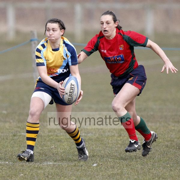 Charlotte Keane passes the ball as Ally Taft closes in. Worcester v Lichfield at Sixways, Pershore Lane, Hindlip, Worcester on 7th April 2013 KO 1430.