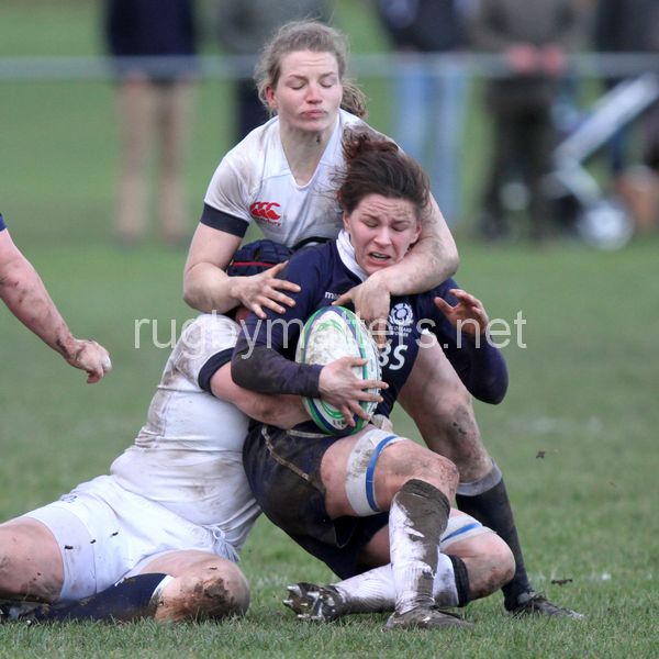 Ruth Slaven tackled by Claie Purdy and Hannah Gallagher. Scotland Women v England Women in the Six Nations 2014 at Rubislaw, Aberdeen, Scotland on Sunday 9th February 2014, kick off 1400