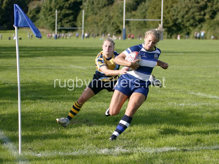 Kay Wilson races to the line to score a try despite Steph Johnston's tackle. Bristol v Worcester at Portway Rugby Development Centre, Bristol on 6th October 2013, ko 14.30