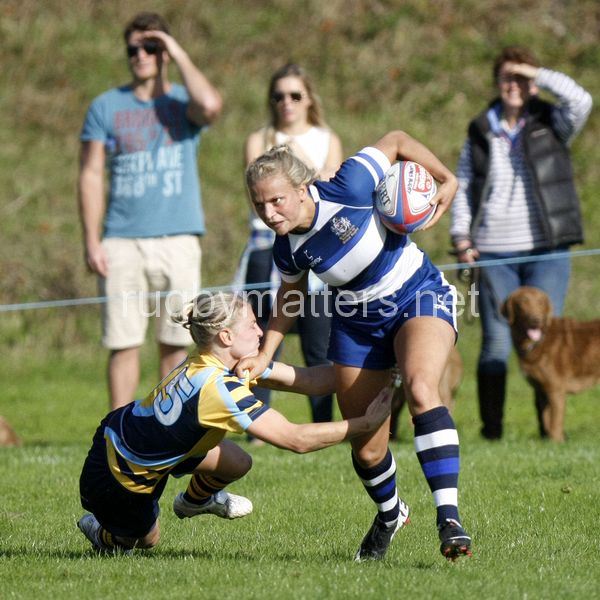 Kay Wilson tries to get away from Steph Johnston's tackle. Bristol v Worcester at Portway Rugby Development Centre, Bristol on 6th October 2013, ko 14.30