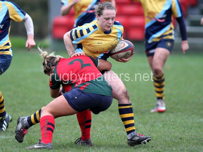Jenny Mills is tackled by Vicky Fleetwood. Lichfield v Worcester at Cooke Fields, Lichfield, England on 24th November 2013 ko 1400
