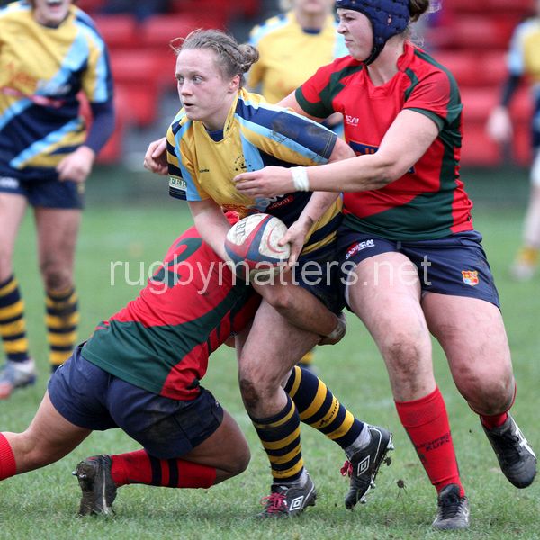 Jenny Mills is tackled by Vicky Fleetwood and Stacy Maguire. Lichfield v Worcester at Cooke Fields, Lichfield, England on 24th November 2013 ko 1400